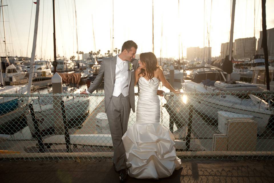 Couple posing by the dock