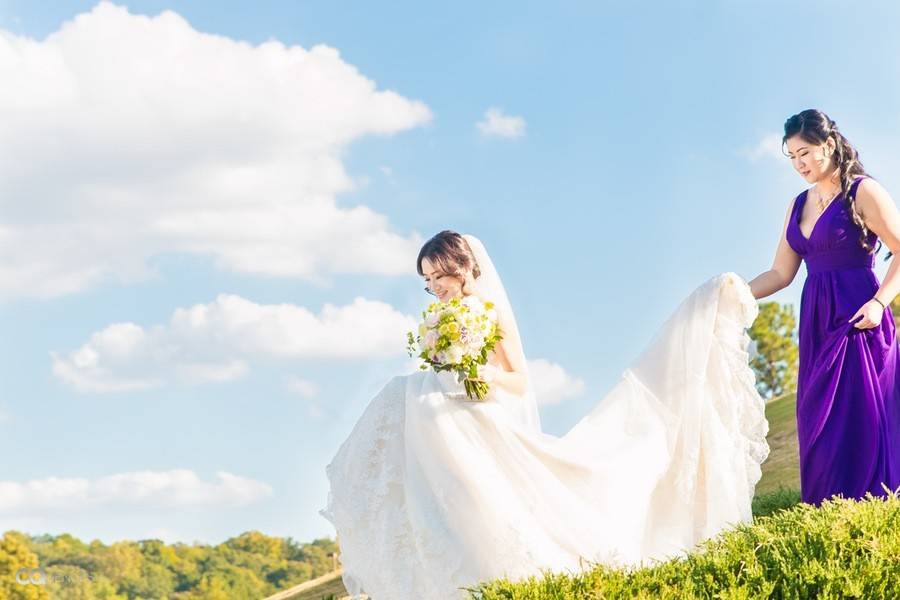 The bride with bridesmaid