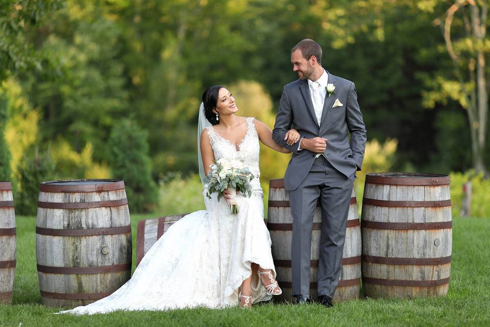 Couple posing in rustic setting