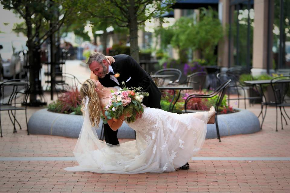 Couple sharing a kiss on a patio