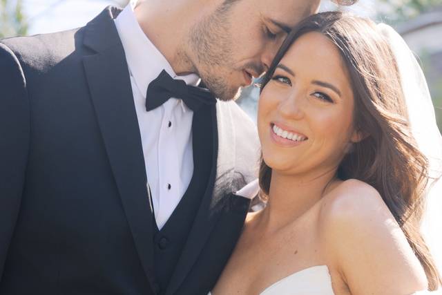 Bride and groom smiling close
