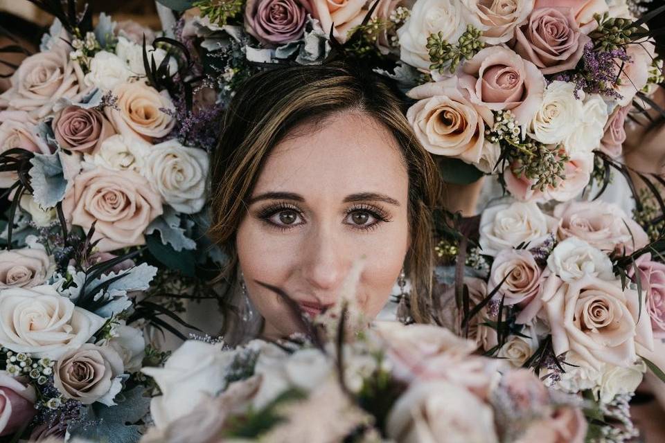 Bride surrounded by roses