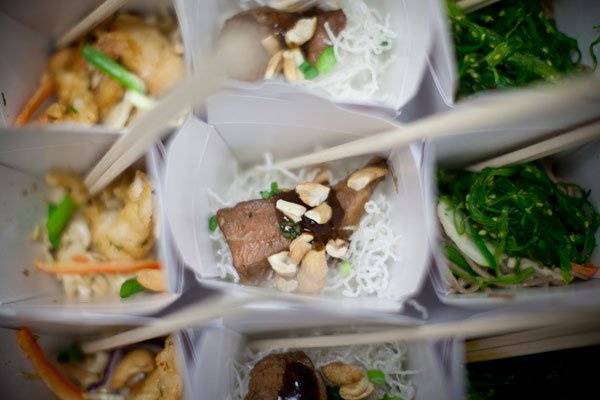 Asian boxes (left to right): Miso sea bass with marinated vegetables, crispy noodles with Kalbi steak and toasted cashews, Chuka salad with sesame Soba noodles