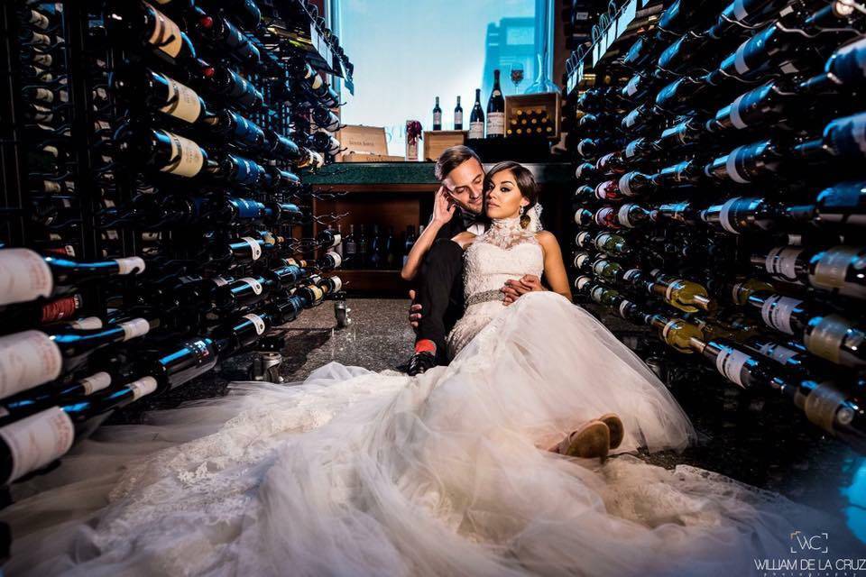 Bride and groom in the wine cellar