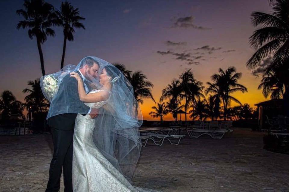 Bride and groom at sunset