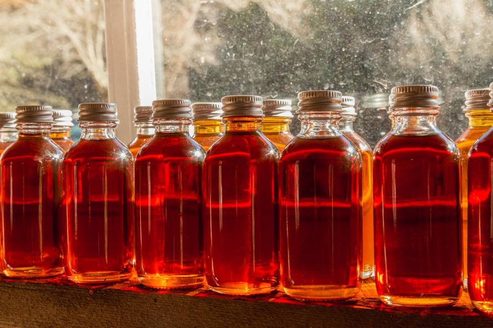 2oz bottles dancing in the sun