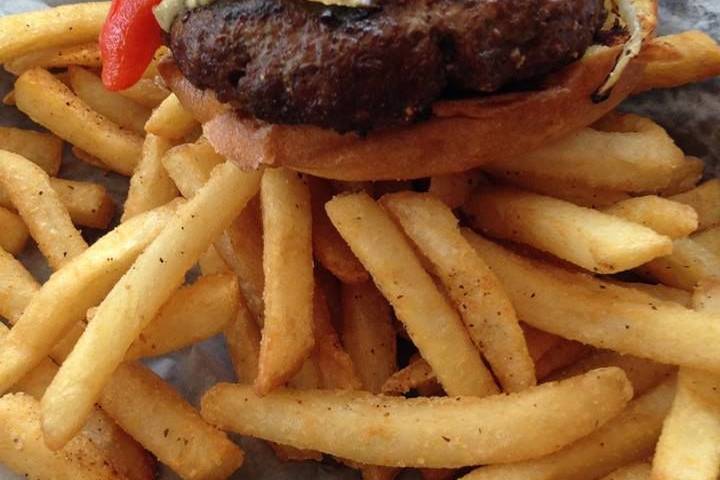 Steakhouse burger, a true patty with roasted red peppers, bleu cheese and a roasted steakhouse onion