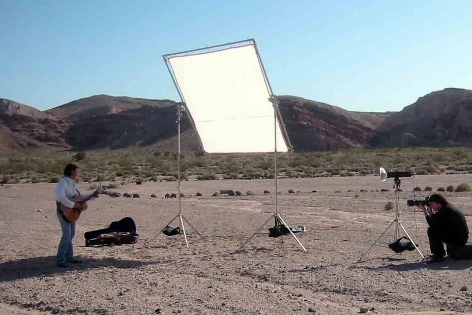 A image of Richard Scudder on location in the Mojave desert photographing a CD cover for a country singer