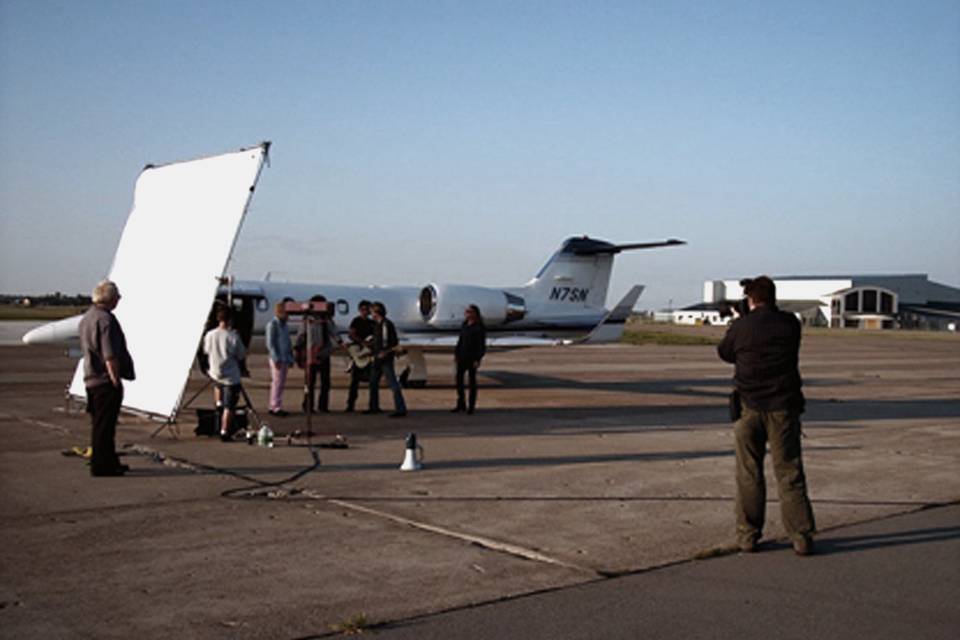 A production still of Richard Scudder shooting at the niagara falls airport