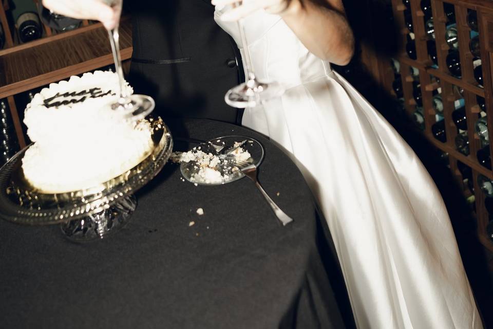 Cake cut in wine cellar