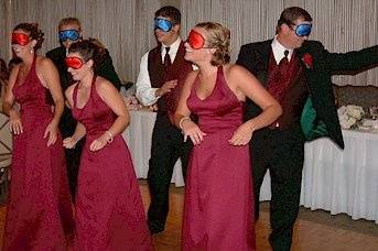 Groomsmen and bridesmaids in blindfolds