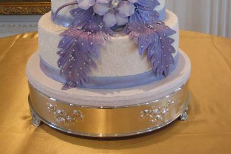 Cake specially made for Brandon and Jun, 4 tiers Gourmet whip cream, decorate with lavander fondant and edible pearls, coconut cake with pinacolada fillings.