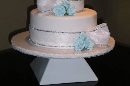 Fondant cake specially made for anne morseth, the design included all elements she was wanting in her cake, bow, some rhinestone and a blue color.