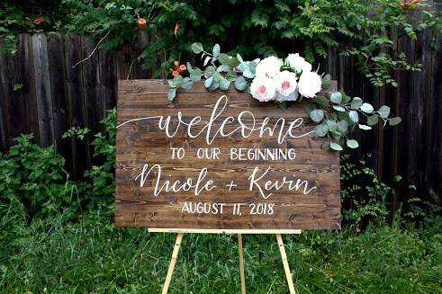 Welcome sign decorated with flowers