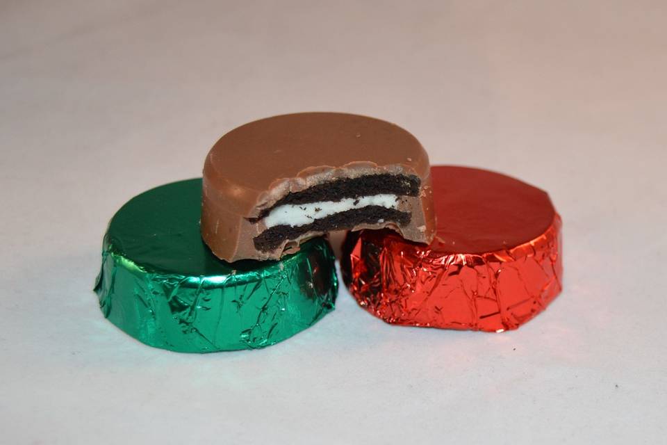 Chocolate Oreo covered cookies available in colorful foil.