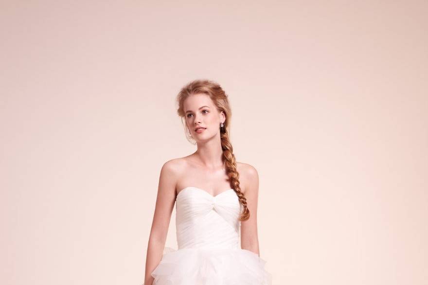 7810
Organza ball gown with draped bodice and ruffled skirt
