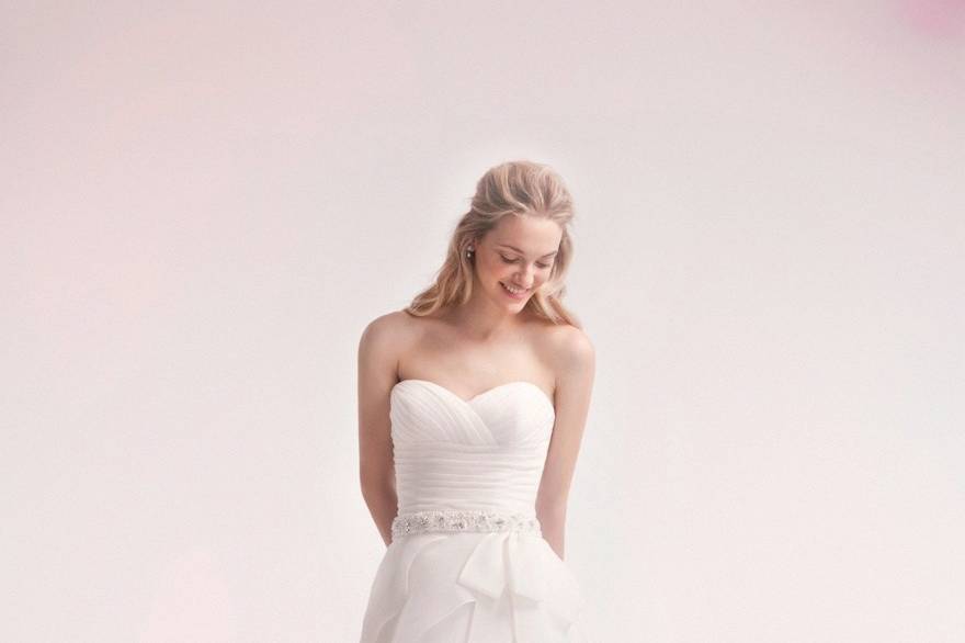 Style 32106007 <br> This a-line gown features a sweetheart neckline with a natural waist in organza and beaded embroidery. It has a chapel train. This gown is only available in Plus Sizes, and is Exclusive to Kleinfeld Bridal.