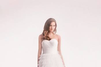 Style 32174138 <br> This a-line gown features a sweetheart neckline with a natural waist in tulle. It has a chapel train. This gown is Exclusive to Kleinfeld Bridal.