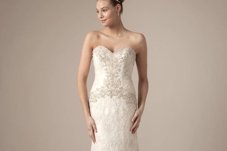 Style 32562399 <br> This mermaid gown features a sweetheart neckline with in alencon lace and beaded embroidery. It has a chapel train. This gown is Exclusive to Kleinfeld Bridal.