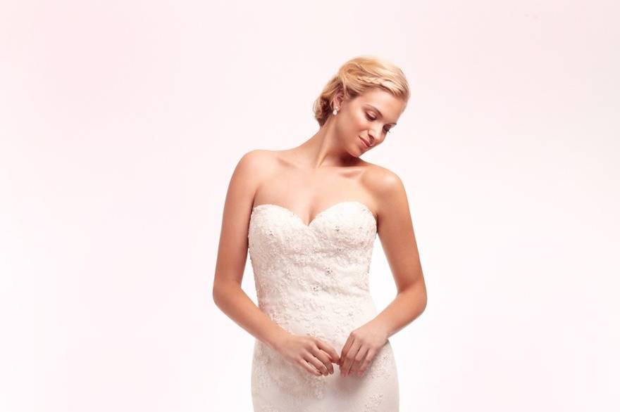 Style 32629594 <br> This mermaid gown features a sweetheart neckline with in lace. It has a chapel train. This gown is available in Plus Sizes, and is Exclusive to Kleinfeld Bridal.