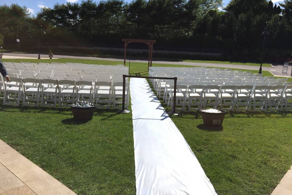 Outdoor ceremony on lawn