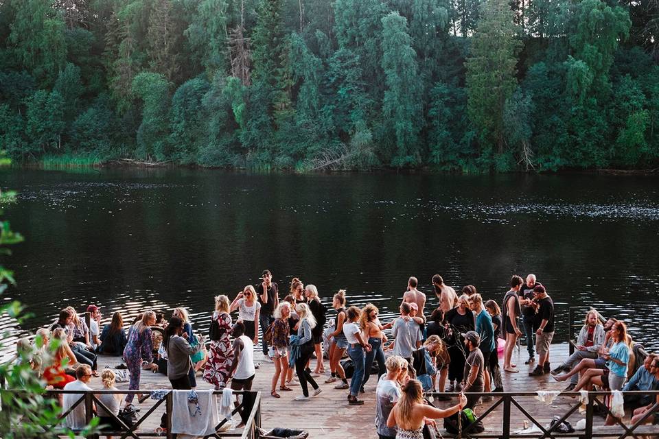 Guests crowd the lake