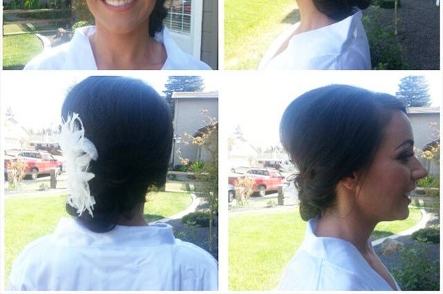Gorgeous Lush Bride side updo to accent her blingy flower and feather hairpiece.