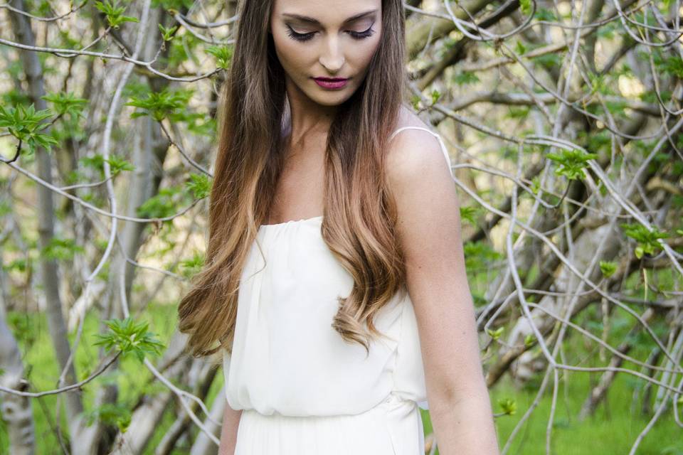 simple half up style to accent her pearl and crystal tiara