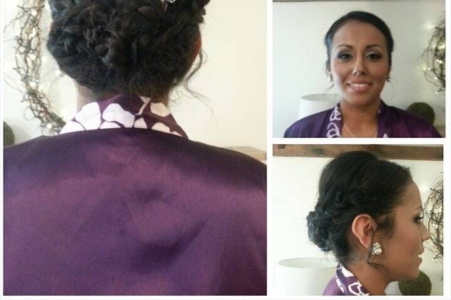 Lush bride with braids on sides leading into a braid twist low updo accented by a gorgeous crystal hairpiece