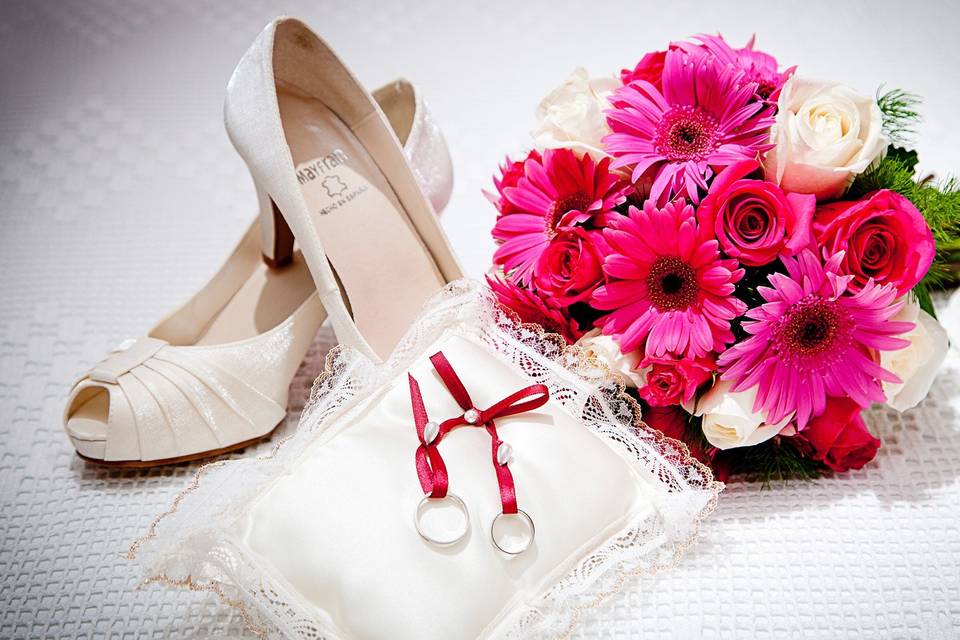 Wedding shoes . bouquet and wedding rings