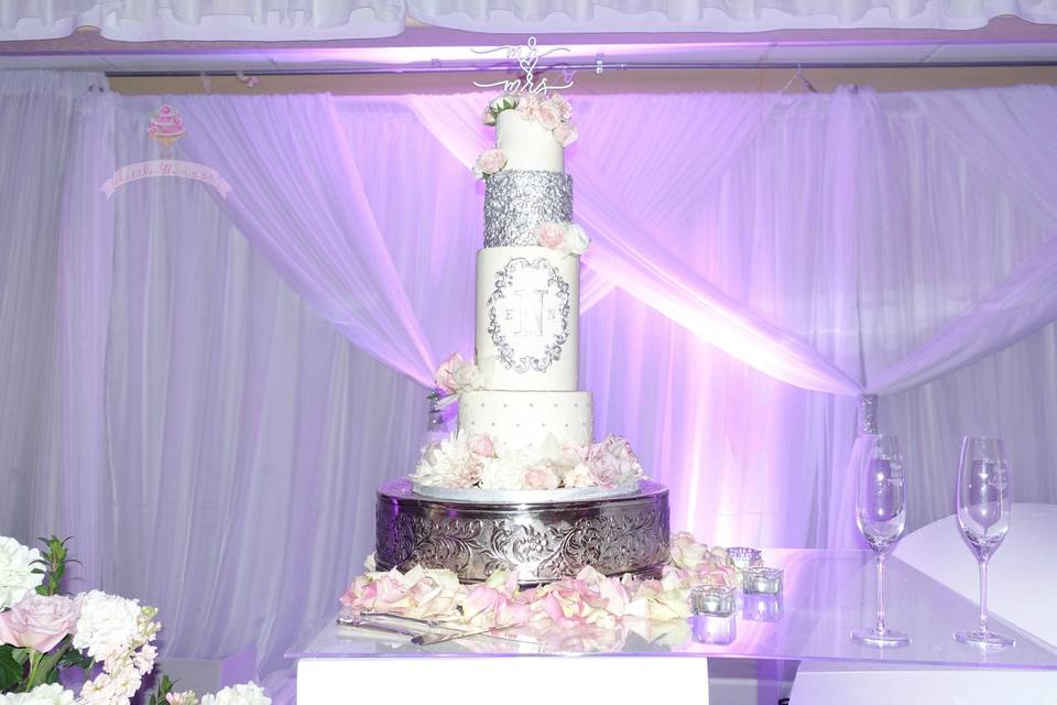 Beautiful buttercream wedding cake with edible sequins