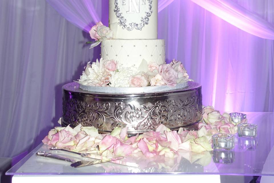 Beautiful buttercream wedding cake with edible sequins