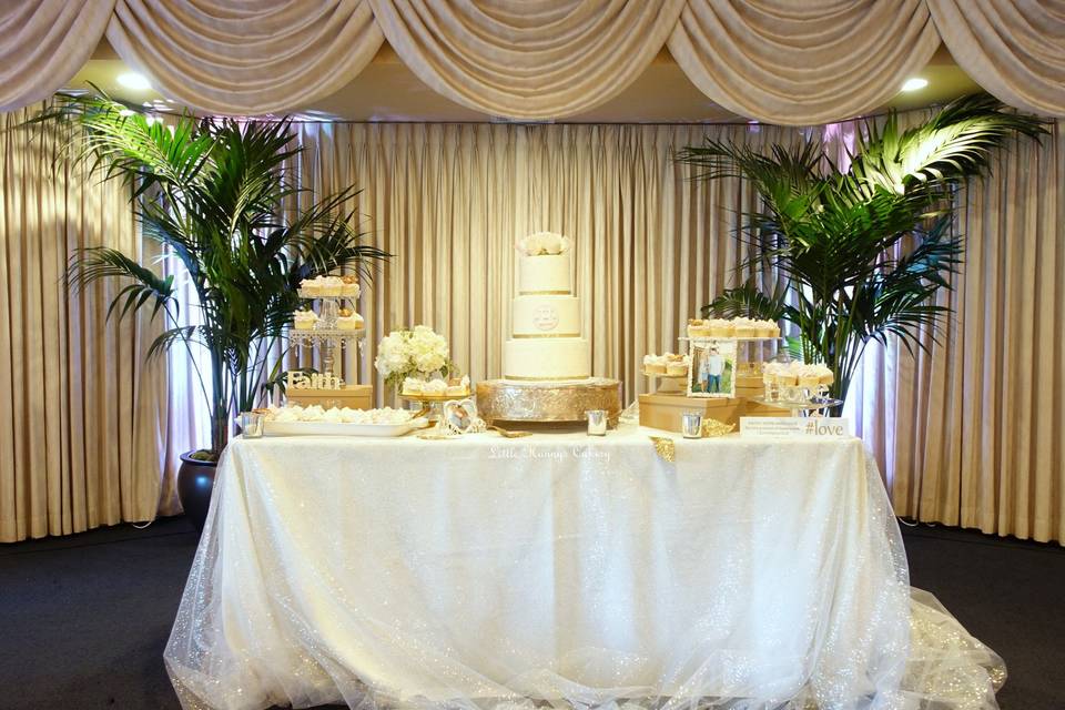 Beautiful buttercream wedding cake and cupcakes