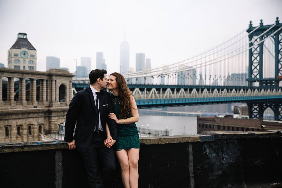 Happy couple stand by blue walls