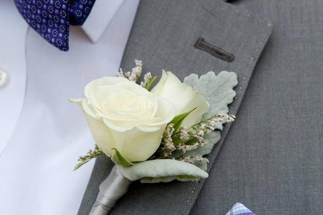 Grey suit and boutonniere