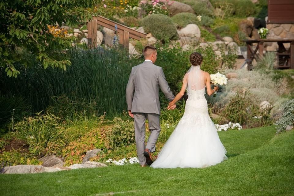 Newlyweds walking around the venue