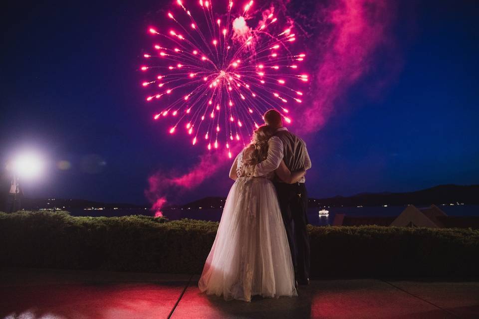 Romantic embrace with fireworks