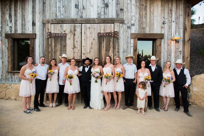 Wedding party in red with swords