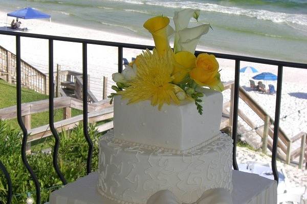 Wedding cake with yellow flowers