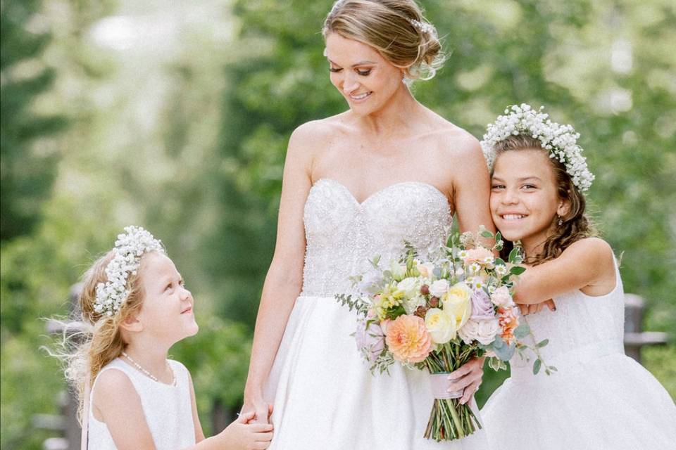 A bride and flower girls