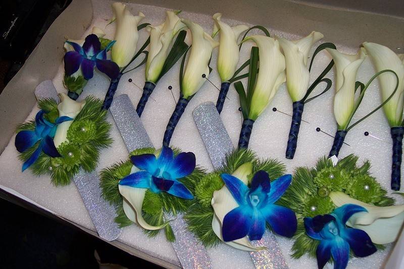 Blue boutonnieres of orchids