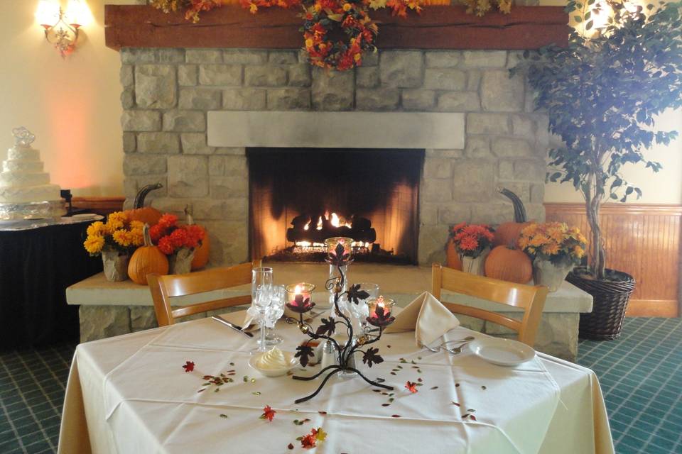 Our two-story stone fireplace is a great backdrop for your sweetheart table. Especially in the Fall and Summer months!