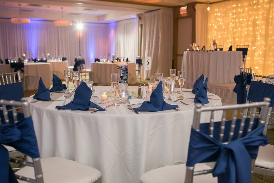Standard white linens with navy details