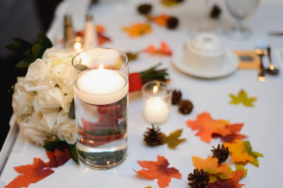 Candles and autumn leaves