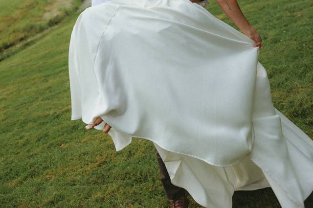 Groom spinning bride around