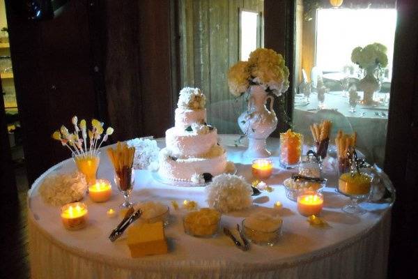 Poplawski-Hively cake table with spot light to accent.  We love using our lighting to help provide a beautiful ambiance to the room.  (At no extra charge!)