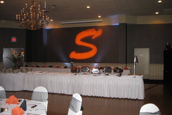 Steinmann-Sowder Wedding. They had us use our specialty light to project their monogram behind the head table.