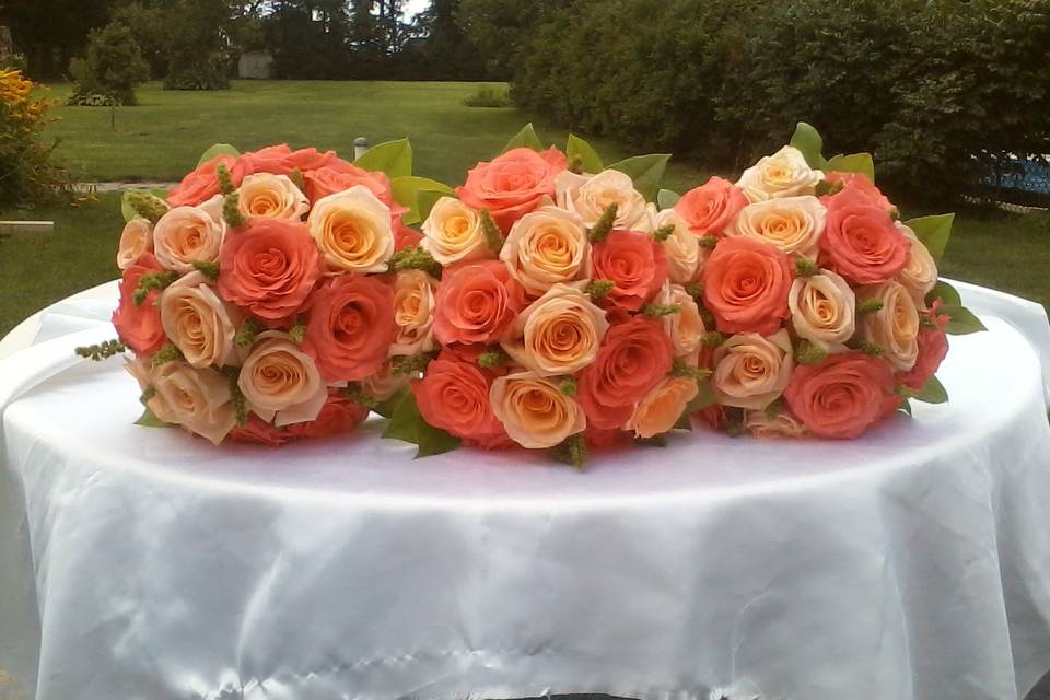 Orange and blush bouquets
