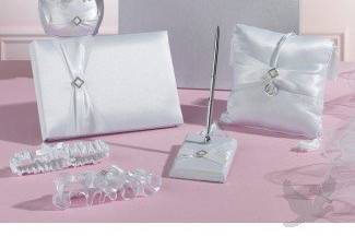 Wedding In A Card Box - White Rhinestone Set. Includes guest book, pen set, pillow, flower basket and two garters. It includes the card box as a bonus!