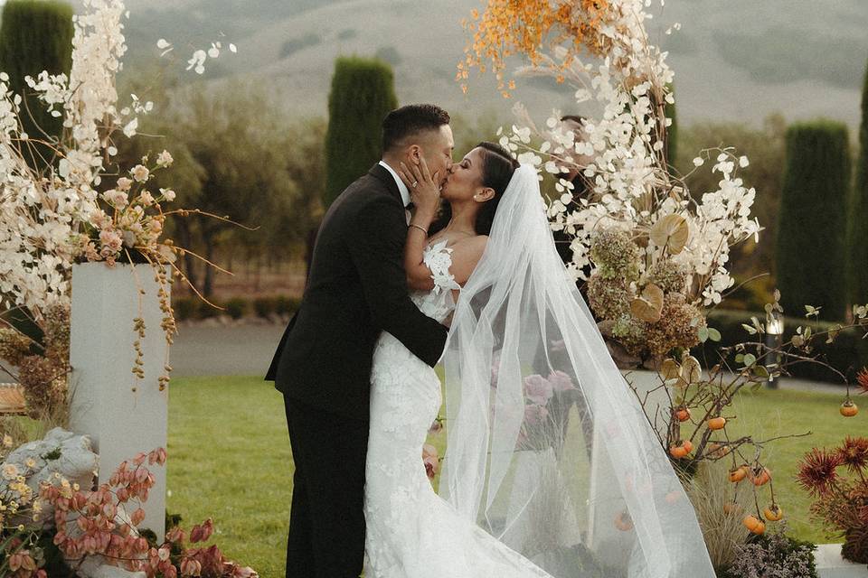 Bride and Groom kiss